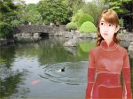 áo dài đỏ trước ao có vịt bơi